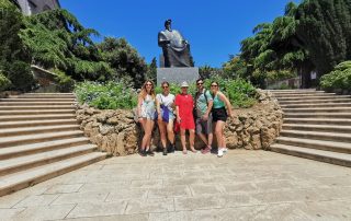 Krka Waterfalls people standing in front of statue